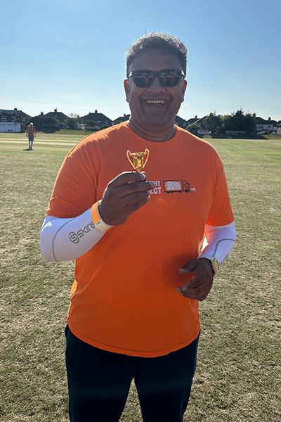 man with medal smiling